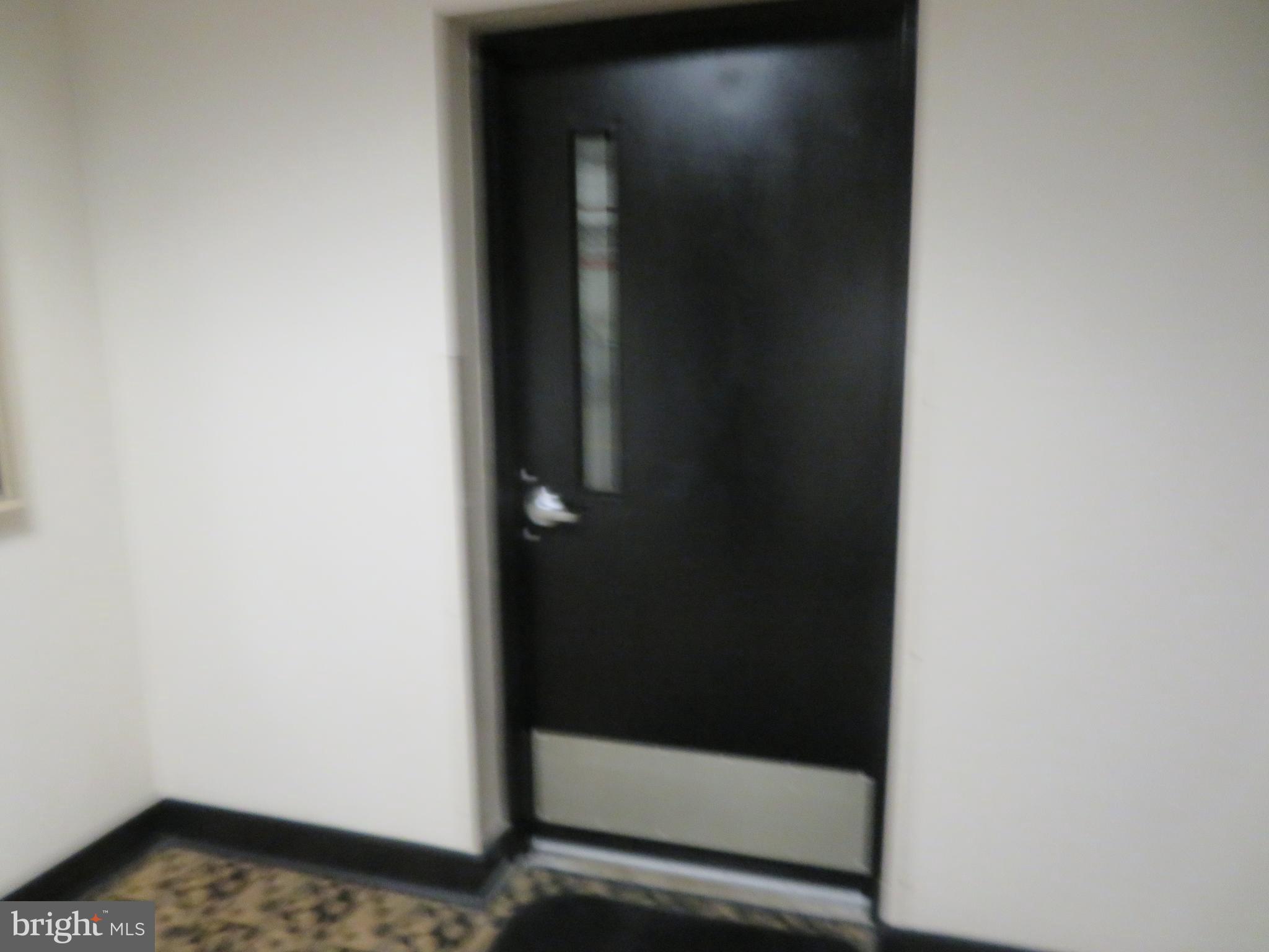 1220 Blair Mill Road, Unit 809 Silver Spring, MD 20910 - Photo 62 of 66 a bathroom with a glass door