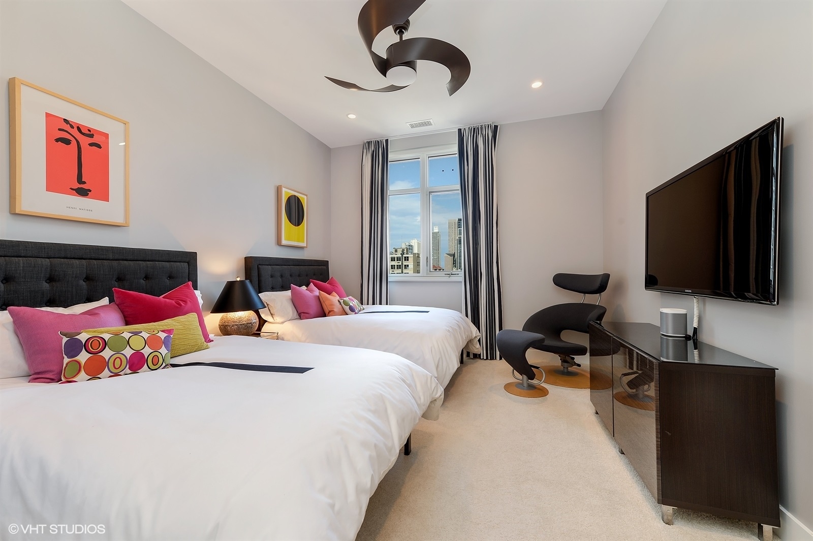 367 West Locust Street, Unit 606 Chicago, IL 60610 - Photo 15 of 24 a bedroom with a bed and a flat screen tv