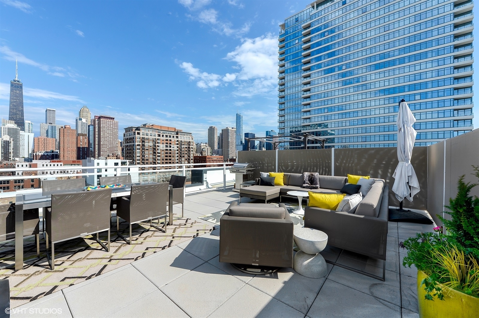 367 West Locust Street, Unit 606 Chicago, IL 60610 - Photo 20 of 24 a building outdoor space with patio furniture and potted plants