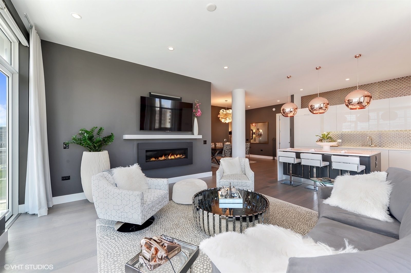 367 West Locust Street, Unit 606 Chicago, IL 60610 - Photo 5 of 24 a living room with furniture fireplace and potted plant
