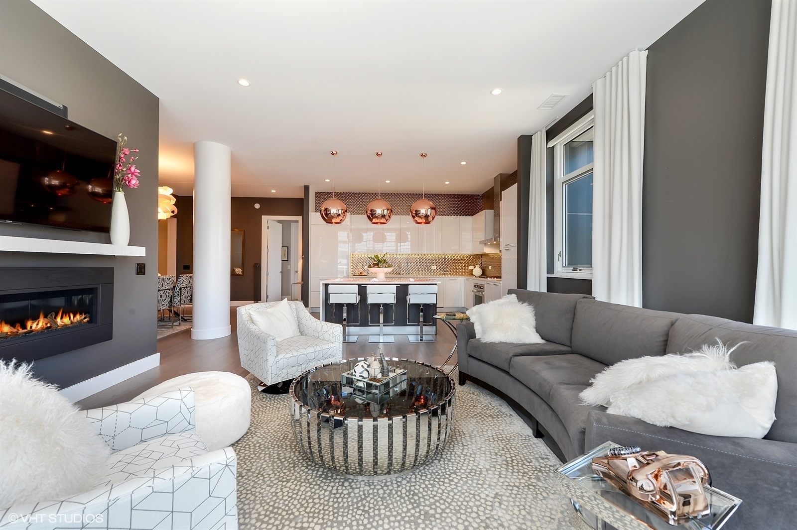 367 West Locust Street, Unit 606 Chicago, IL 60610 - Photo 6 of 24 a living room with furniture and a fireplace