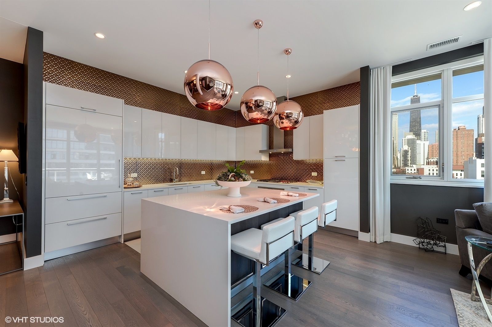 367 West Locust Street, Unit 606 Chicago, IL 60610 - Photo 7 of 24 a kitchen with a table and chairs in it