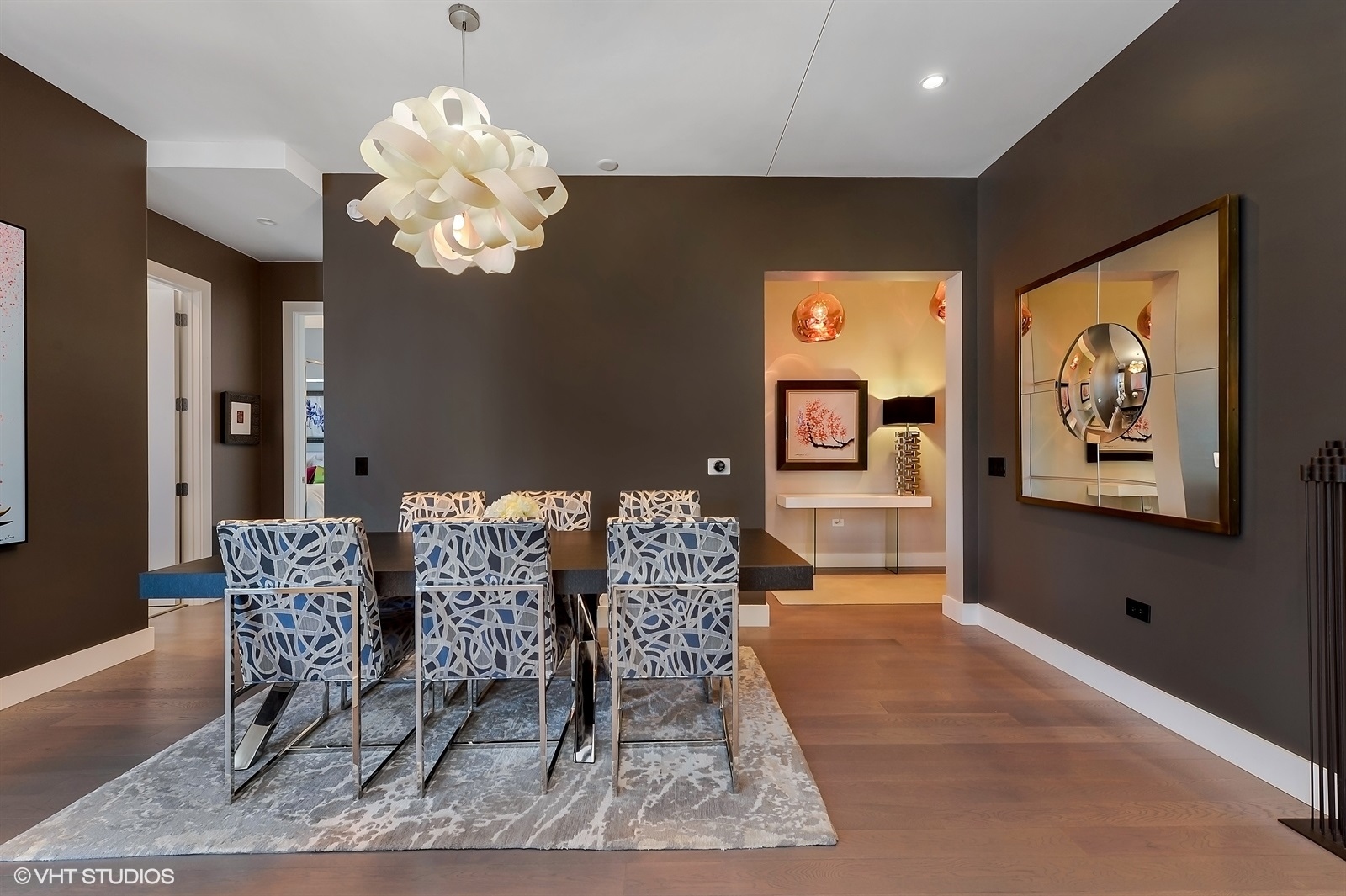 367 West Locust Street, Unit 606 Chicago, IL 60610 - Photo 9 of 24 a view of a dining room with furniture