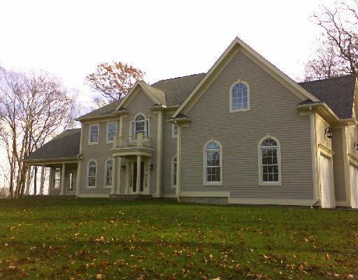 26 Russett Road Newtown, CT 06482 - Photo 1 of 1 a view of a house with a yard