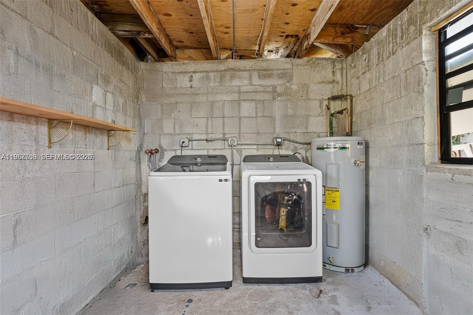 6418 Southwest 39th Terrace Miami, FL 33155 - Photo 23 of 24 a utility room with dryer and washer