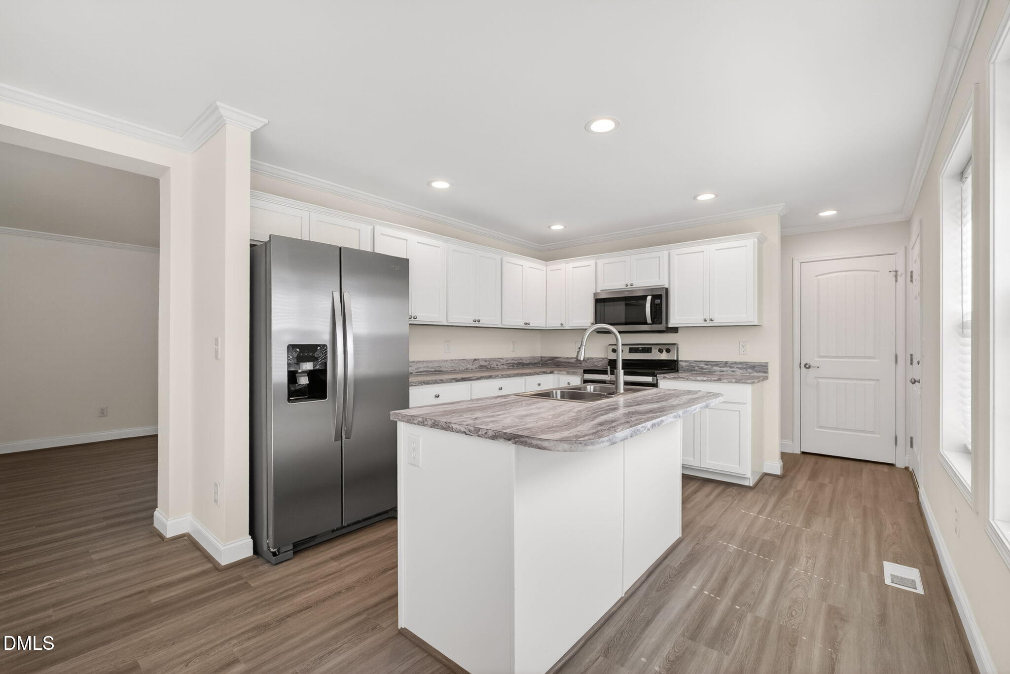 7122 Guess Road Hillsborough, NC 27278 - Photo 4 of 48 a kitchen with stainless steel appliances granite countertop a refrigerator and a stove top oven