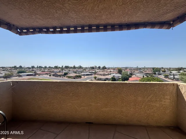 a view of a terrace with chairs