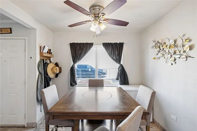 a kitchen with stainless steel appliances a refrigerator sink and cabinets