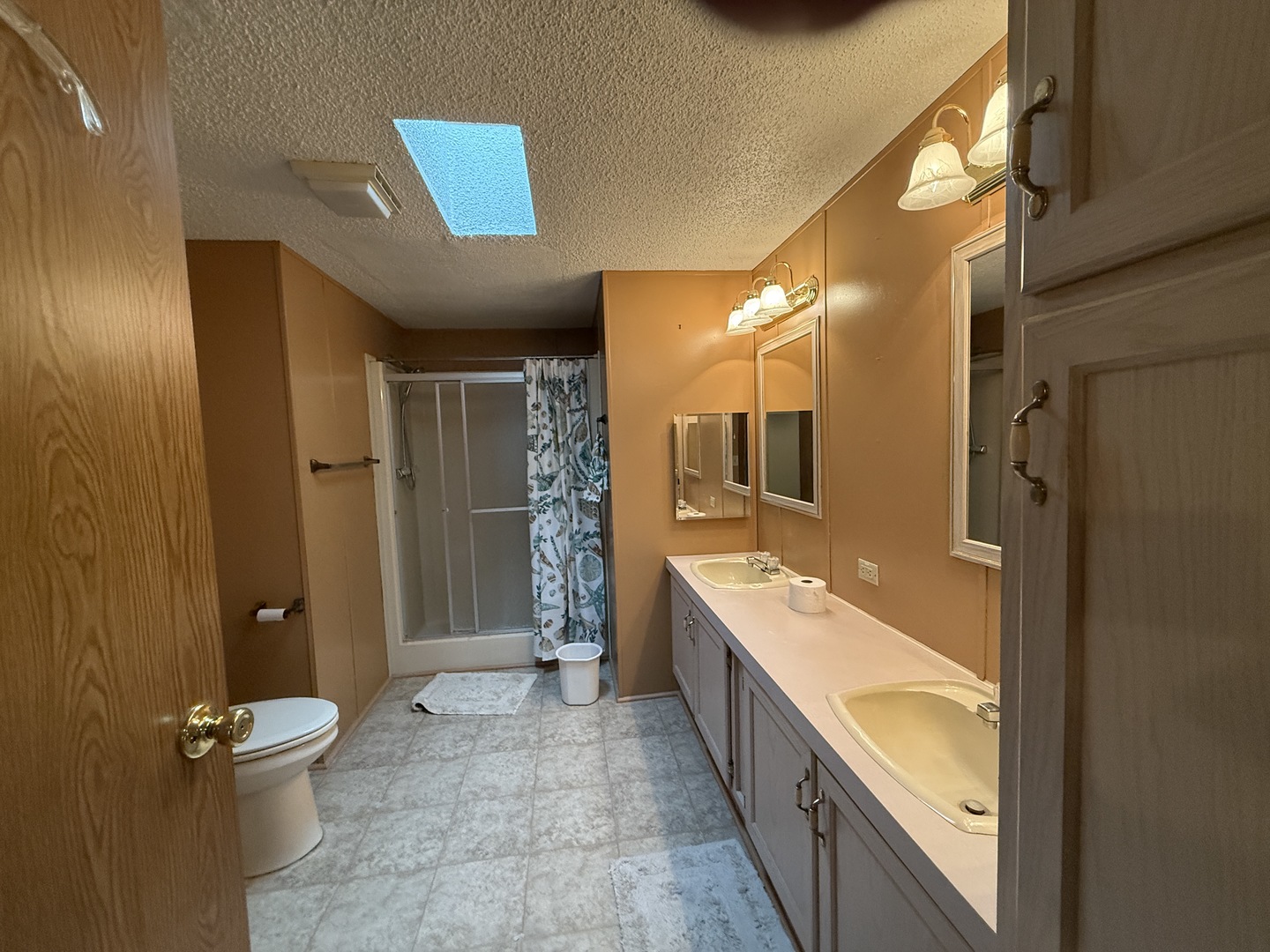 35 Partridge Lane Beecher, IL 60401 - Photo 6 of 34 a bathroom with a granite countertop sink a toilet a mirror and shower