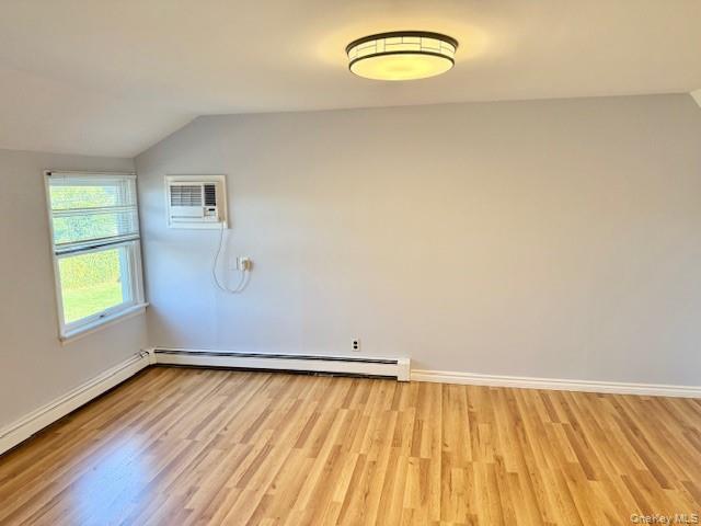 10 Revere Road Port Washington, NY 11050 - Photo 14 of 17 a view of a room with wooden floor and a window