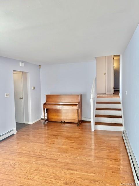 10 Revere Road Port Washington, NY 11050 - Photo 5 of 17 a view of empty room with wooden floor