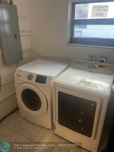 281 Northwest 52nd Street Miami, FL 33127 - Photo 17 of 28 a utility room with dryer and washer