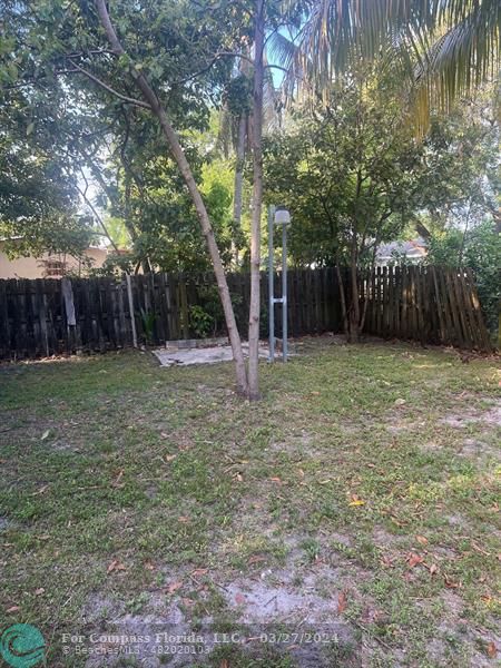 281 Northwest 52nd Street Miami, FL 33127 - Photo 23 of 28 a view of a backyard with tree s