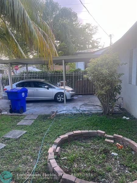 281 Northwest 52nd Street Miami, FL 33127 - Photo 8 of 28 a view of a garden with patio