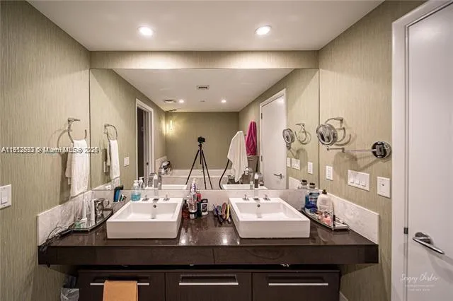 a view of balcony with a large window and wooden floor