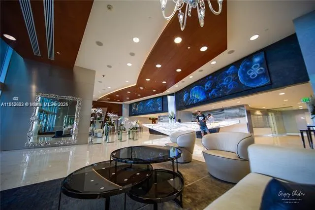 a view of water with tall building