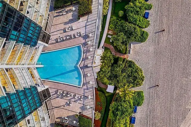 a bedroom with bed and window