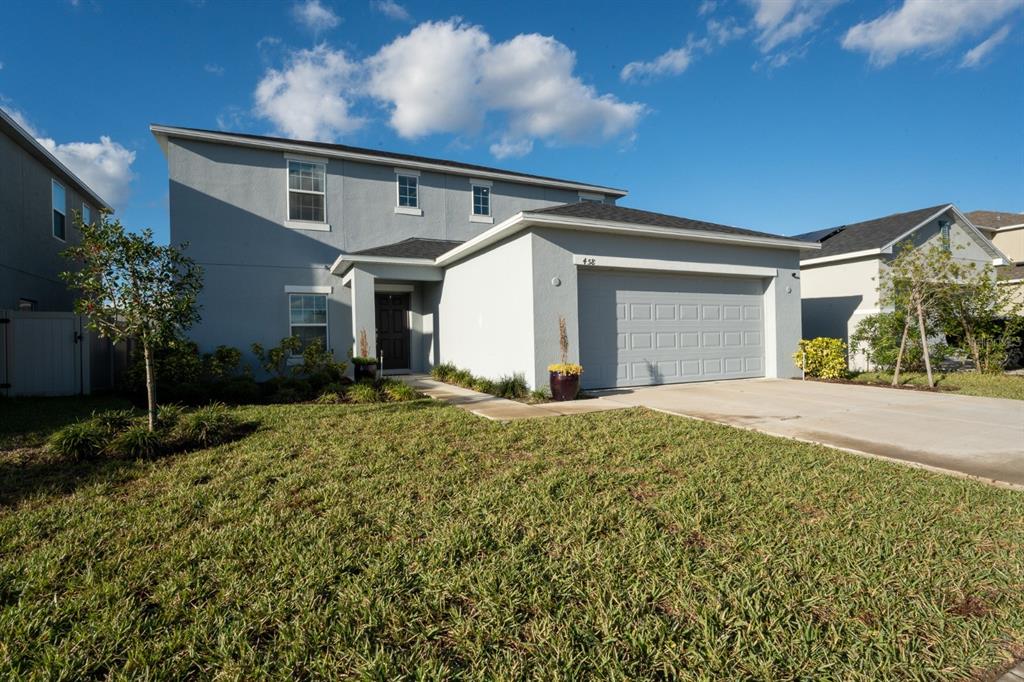 458 Hamlet Loop Davenport, FL 33837 - Photo 1 of 19 a view of a house with a yard