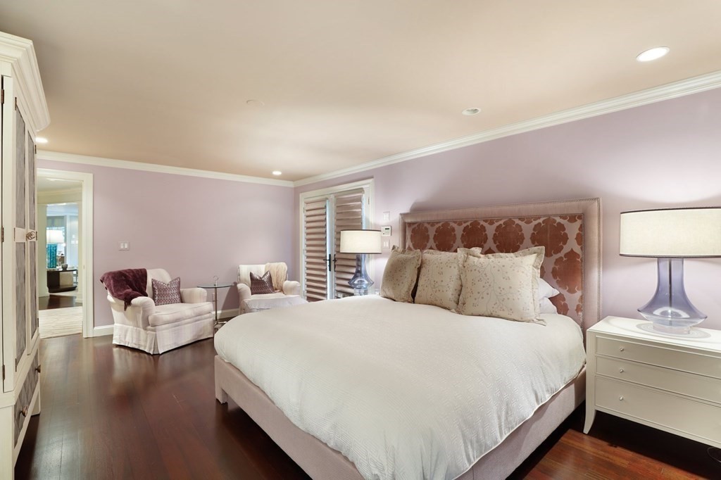 37 Autumn Road Weston, MA 02493 - Photo 13 of 42 a large bedroom with a bed and wooden floor