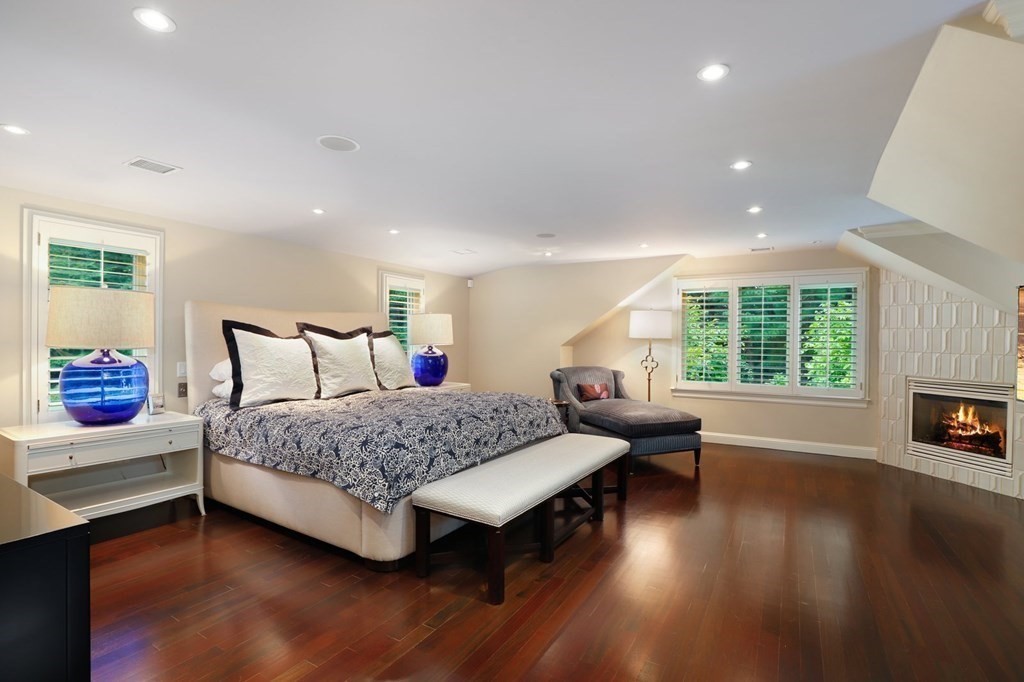 37 Autumn Road Weston, MA 02493 - Photo 17 of 42 a living room with furniture and a fireplace