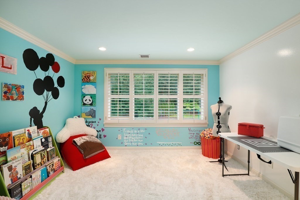 37 Autumn Road Weston, MA 02493 - Photo 25 of 42 a bedroom with furniture and a large window