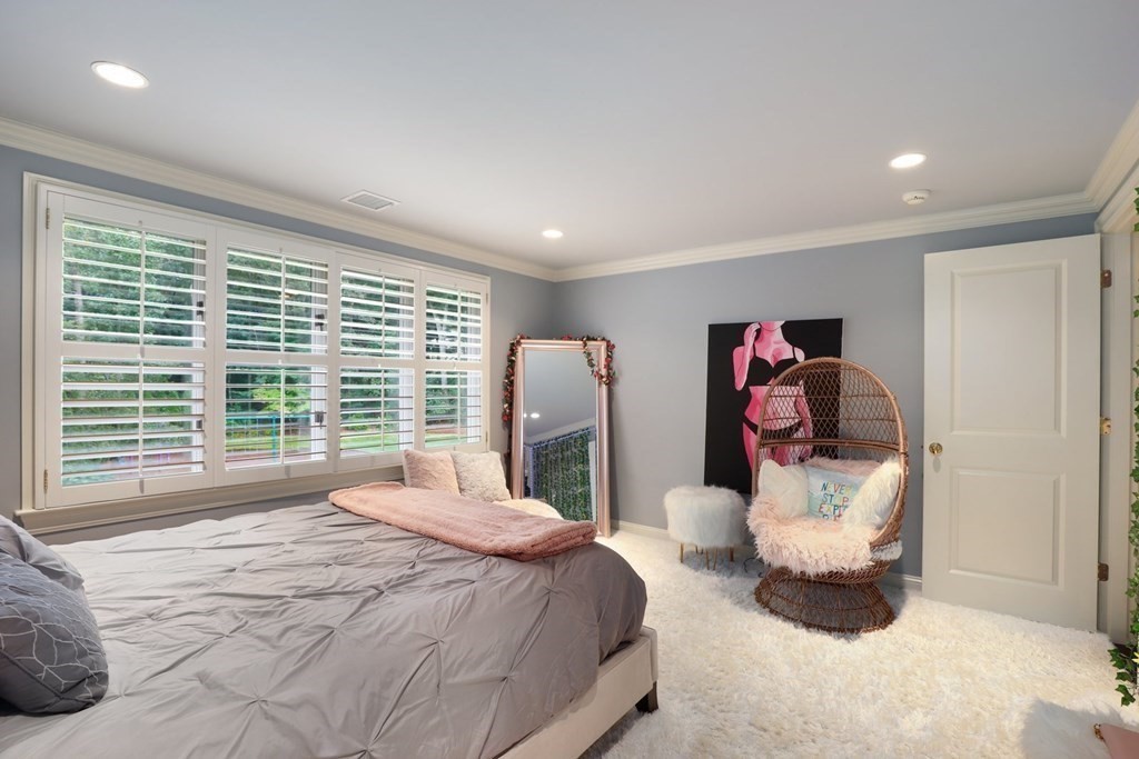 37 Autumn Road Weston, MA 02493 - Photo 28 of 42 a bedroom with a bed and a large window