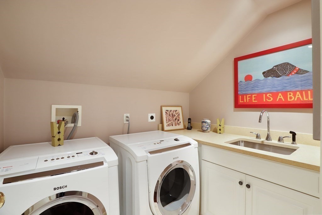 37 Autumn Road Weston, MA 02493 - Photo 29 of 42 a utility room with dryer and washer