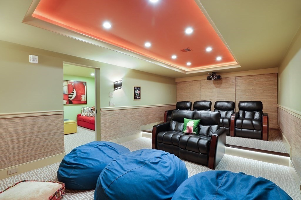 37 Autumn Road Weston, MA 02493 - Photo 36 of 42 a living room with furniture and a wooden floor