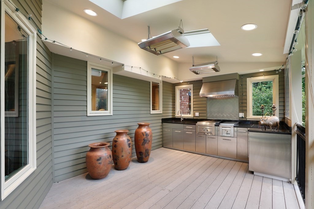 37 Autumn Road Weston, MA 02493 - Photo 39 of 42 a kitchen with sink cabinets and wooden floor