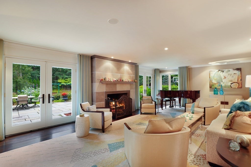 37 Autumn Road Weston, MA 02493 - Photo 9 of 42 a living room with furniture and a fireplace