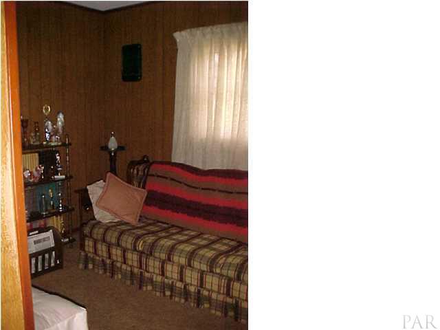 6415 Hampton Road Pensacola, FL 32505 - Photo 10 of 11 a living room with furniture and window
