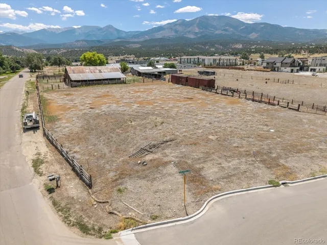 a view of a swimming pool with a lake view
