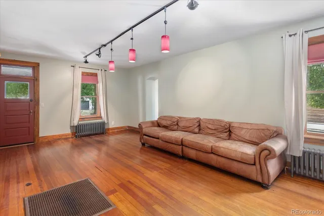 a living room with furniture and window