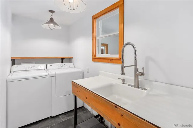 a utility room with dryer and washer
