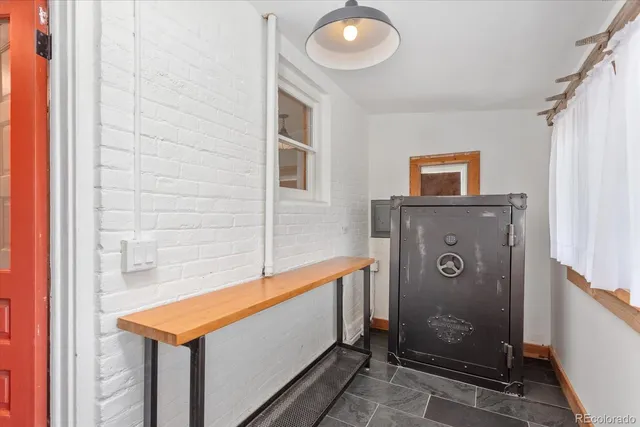 a bathroom with a sink a mirror and shower