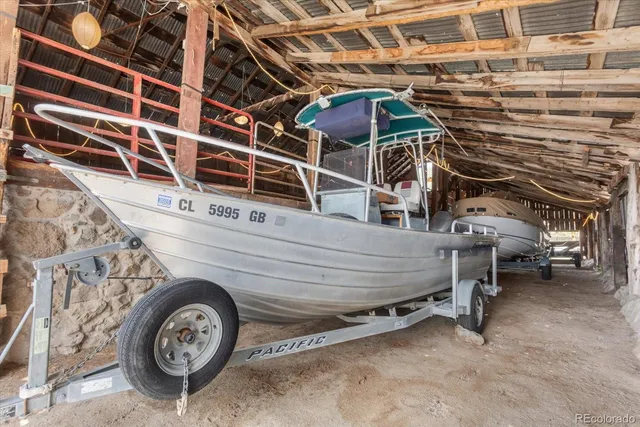 a view of a room with a car parked car