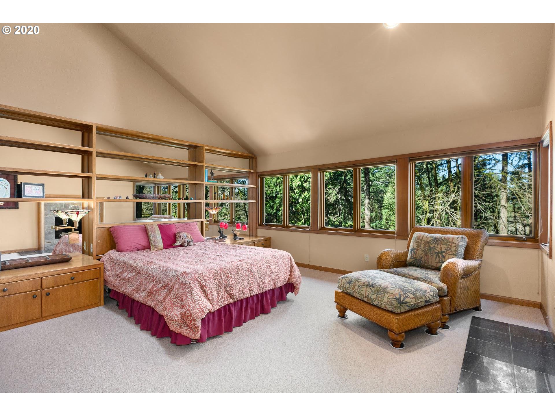 2654 Southwest Fairmount Boulevard Portland, OR 97239 - Photo 14 of 32 a room with a bed and a couch