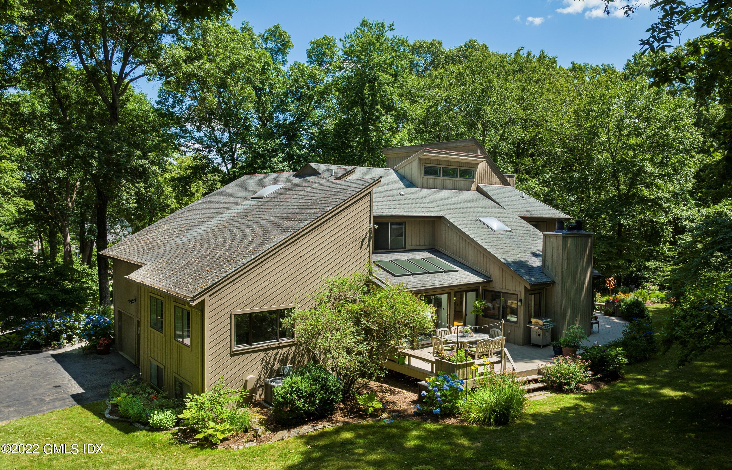 300 Mountain Road Wilton, CT 06897 - Photo 4 of 37 aerial view of a house with a yard