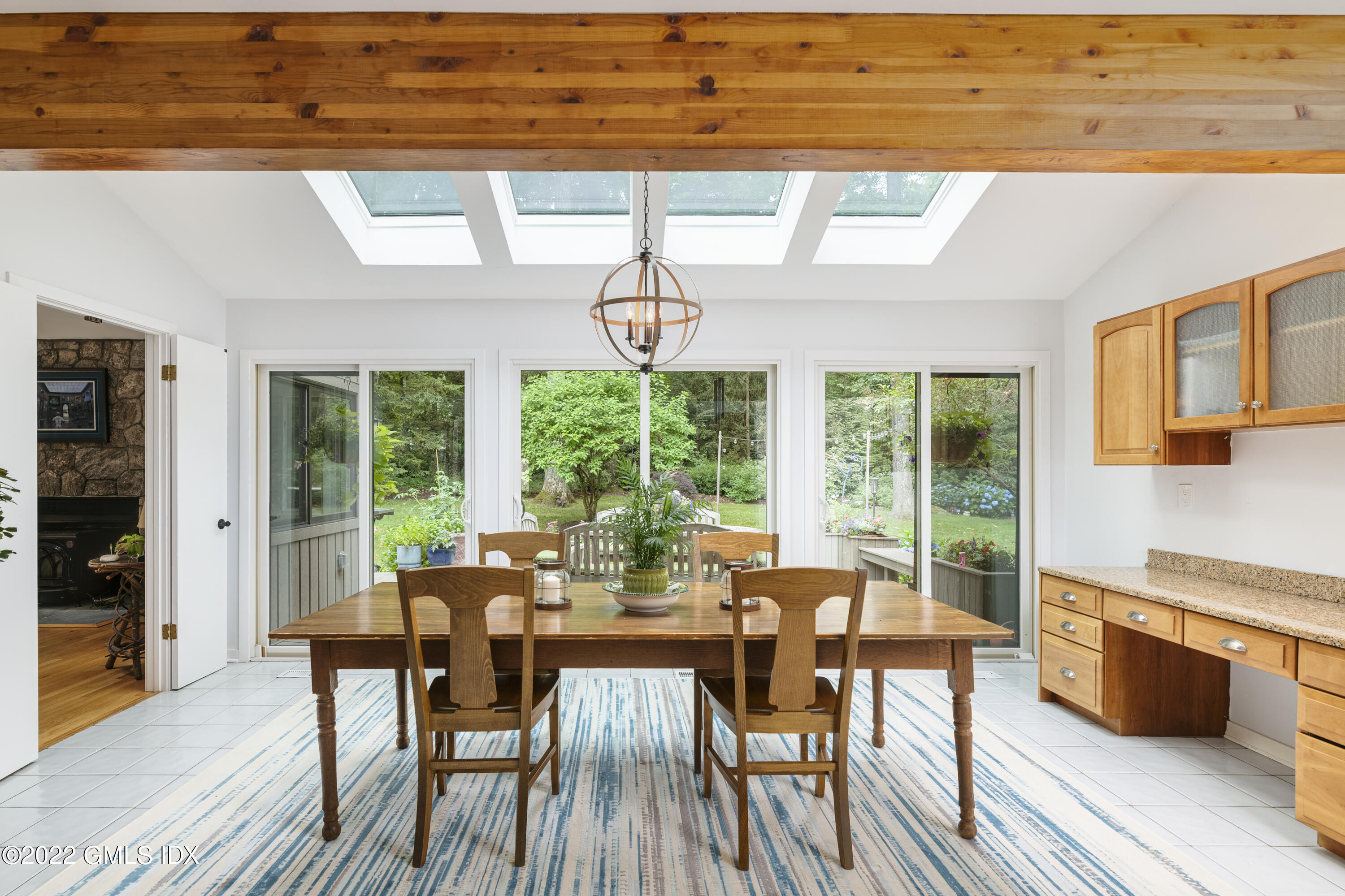 300 Mountain Road Wilton, CT 06897 - Photo 8 of 37 a view of a dining room with furniture window and outside view
