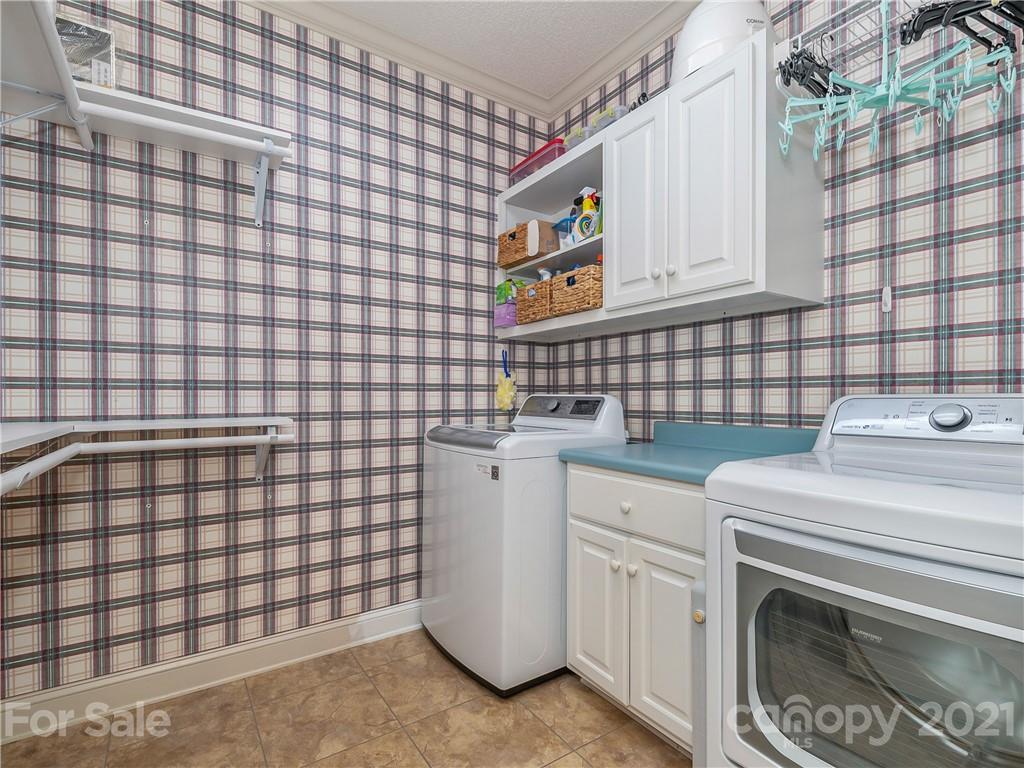 631 Pleasant Hill Church Road Rutherfordton, NC 28139 - Photo 22 of 48 a utility room with dryer and washer