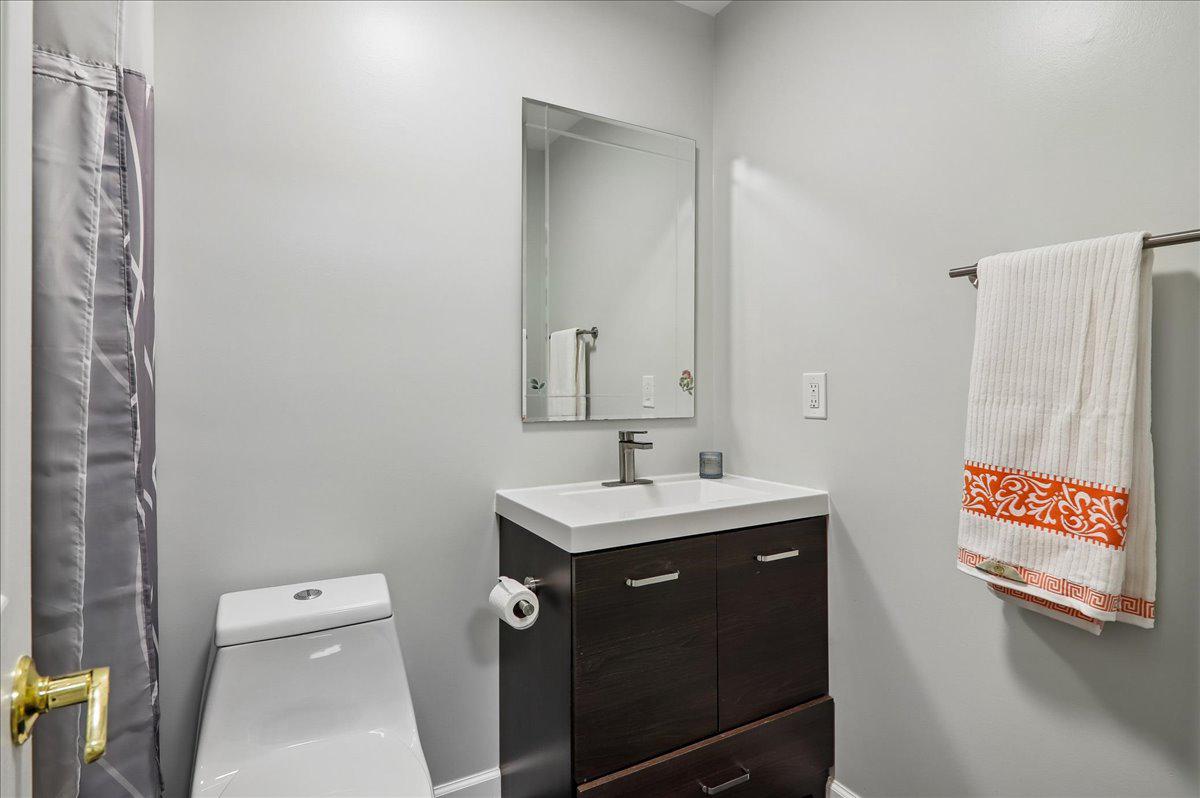 7408 Spring Tree Drive Springfield, VA 22153 - Photo 22 of 48 Hall updated modern bathroom with elegant touches.