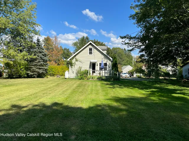 a view of a house with a big yard