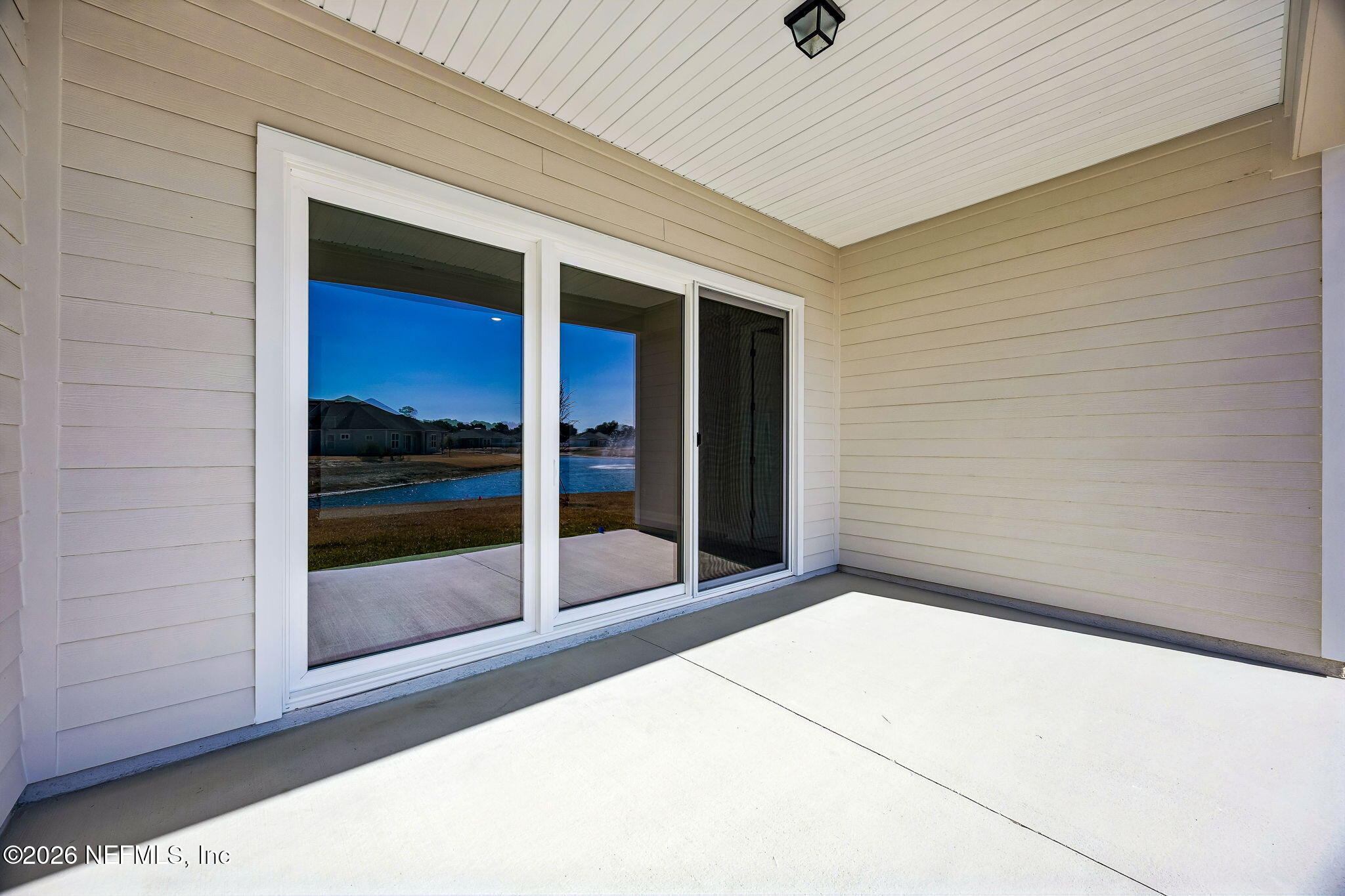 85417 Sandy Rdg Loop, Unit 84 Yulee, FL 32097 - Photo 21 of 23 Covered Porch