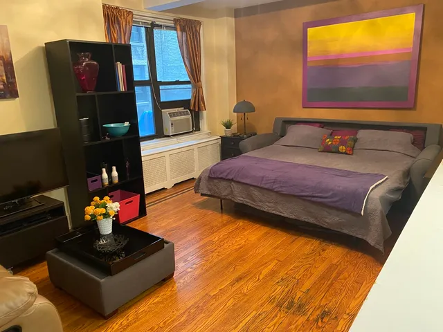 a picture of a park with furniture and a window