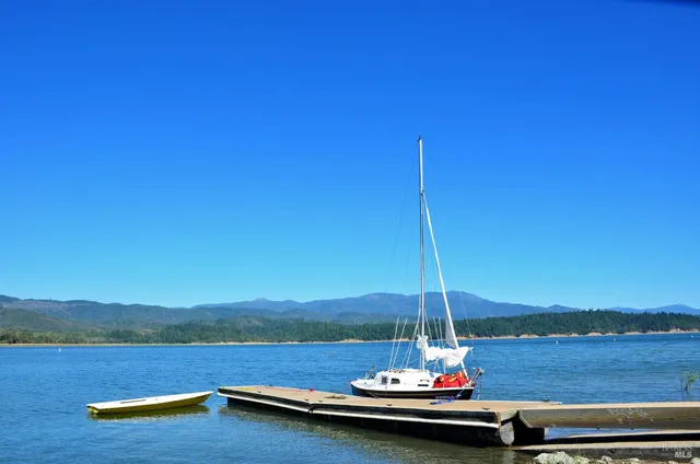 a view of a lake with a mountain in the background
