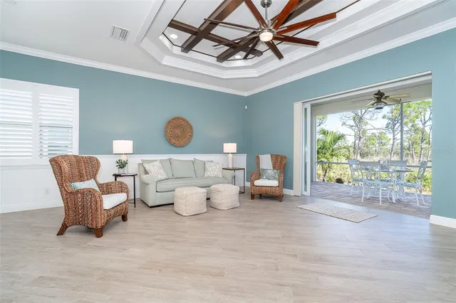 a view of a livingroom with furniture and windows