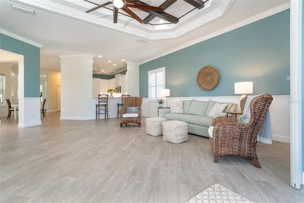 a bedroom with furniture and a window