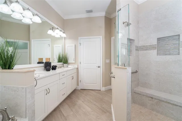 a bathroom with a sink and a window