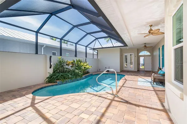 a house view with a seating space and garden