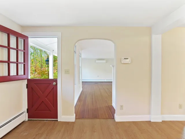 view of room with window and wooden floor